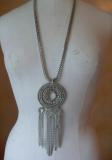 Sautoir rond strass et pompons
