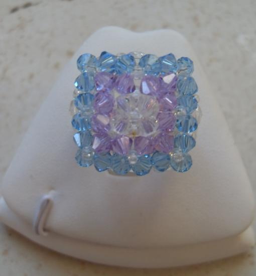 Bague carr�e cristal swarovski turquoise-mauve.