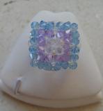 Bague carr�e cristal swarovski turquoise-mauve.