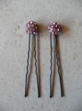 Epingles cheveux boule de strass rose.